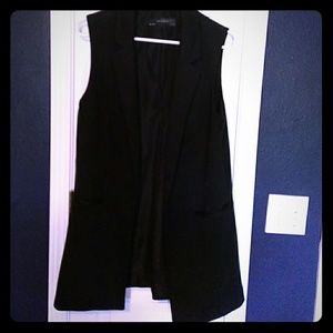 Sleeveless black blazer
